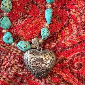 Beautiful handmade faux turquoise and silver necklace.